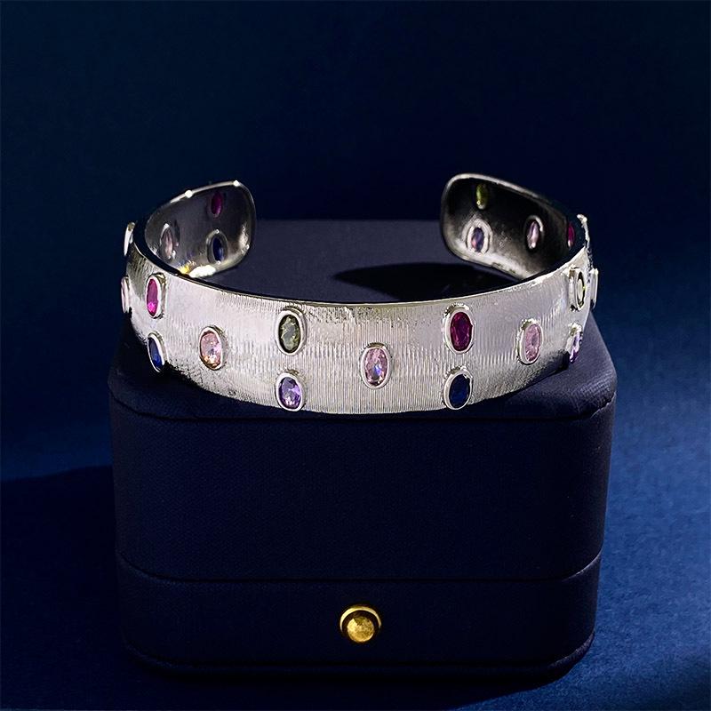 Brushed Gold-Plated C-Shaped Bracelet with Oval Gem