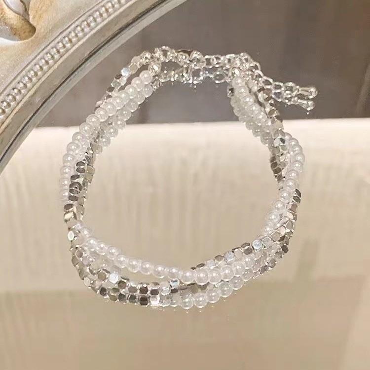Pearl Womens Bracelet With Irregular Silver Beads And Tassel Accents For A Look Classy
