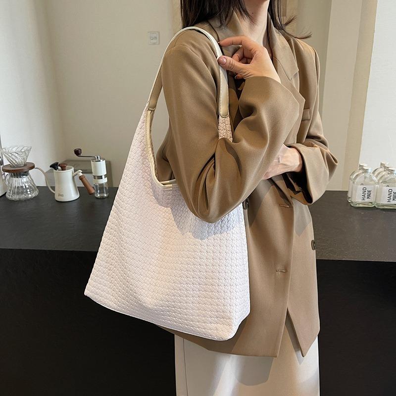 Mode beliebte Retro gewebte Pendler-Tragetasche Nischendesign Achseltasche Damen große Kapazität Schultertasche