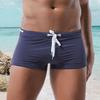 Pantalones cortos de baño de verano para hombre, bañadores ajustados de playa de Color sólido de tiro bajo con lazo en la cintura, pantalones cortos deportivos para Surf, bañadores