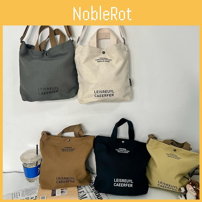 Kinder Modische Umhängetasche mit Buchstabenmuster Leicht und vielseitig für die Schule