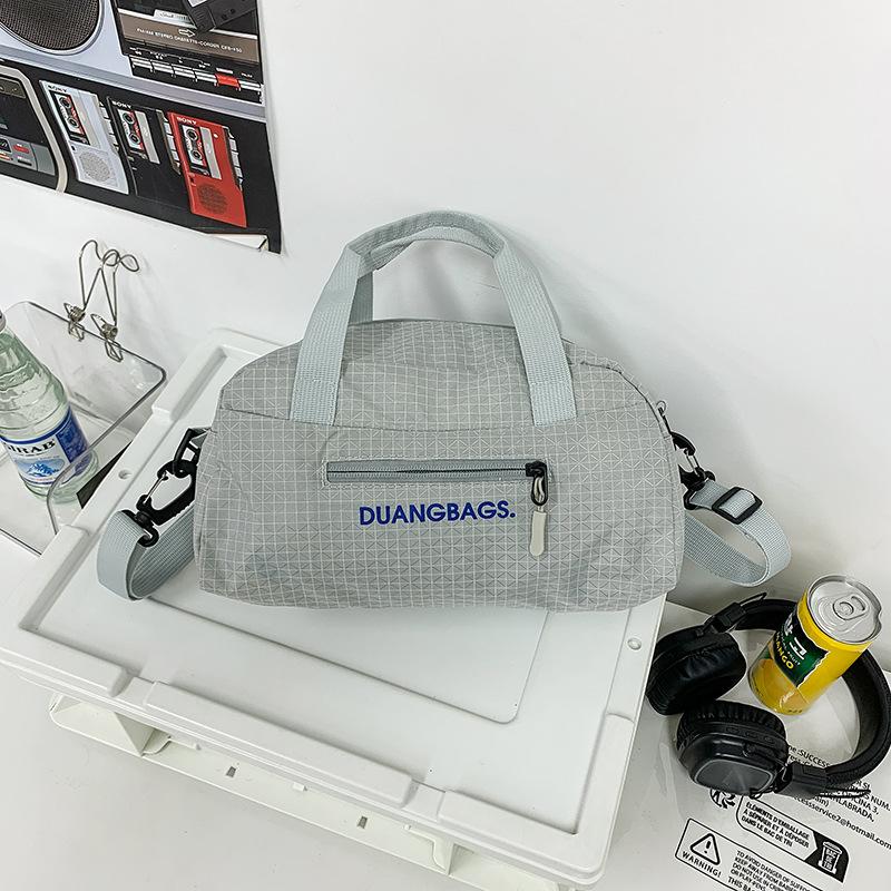 

College students take classes, simple and versatile fashion shoulder bags, women s summer new large-capacity messenger bags сірий колір