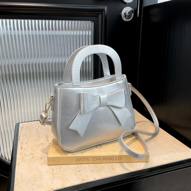 

Bow fashion Korean version of foreign style handbag 2025 spring new versatile ins shoulder messenger bag small square bag срібний
