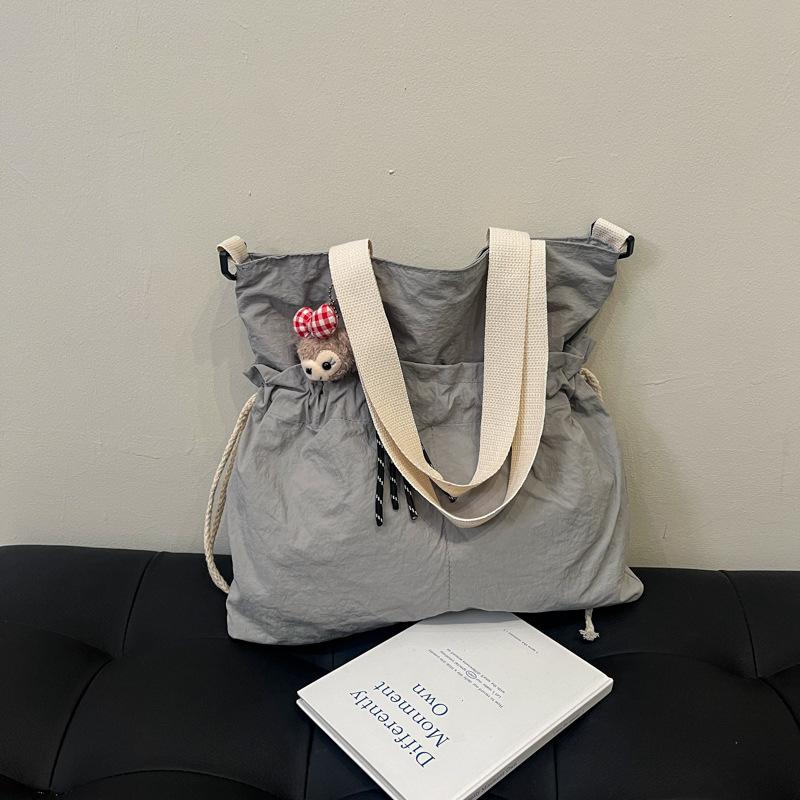 

2025 new Japanese large-capacity literary style light and simple bag, casual fashion tote bag, student shoulder bag no pendant