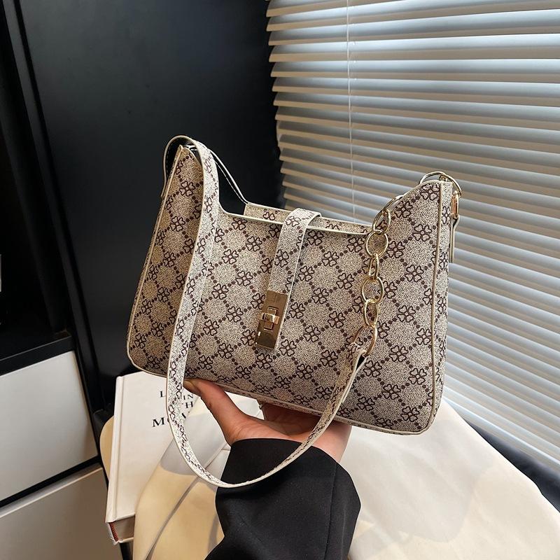 

2025 French new retro trend printed chain shoulder armpit bag niche aesthetic texture handbag хаки