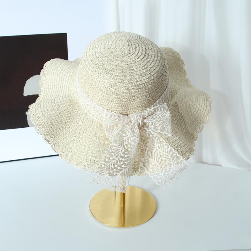 Straw hat female lace bow large brim foldable sunscreen visor seaside beach sweet bucket hat