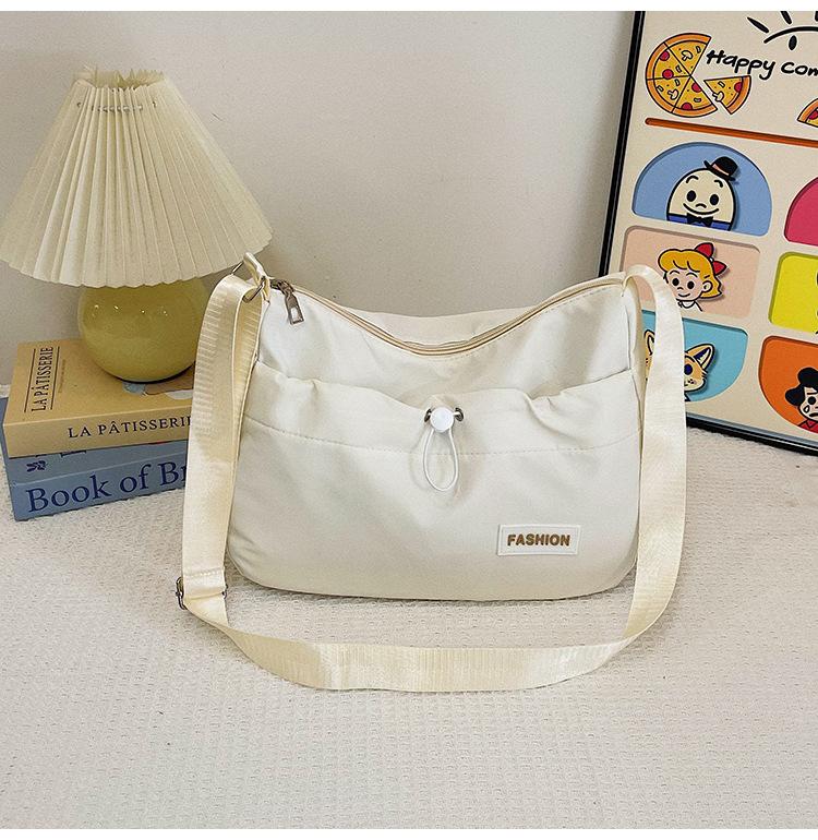 

Весна и лето 2025 новая женская сумка через плечо большой вместимости классная сумка-мессенджер для поездок на работу студенческая повседневная универсальная холщовая колледж