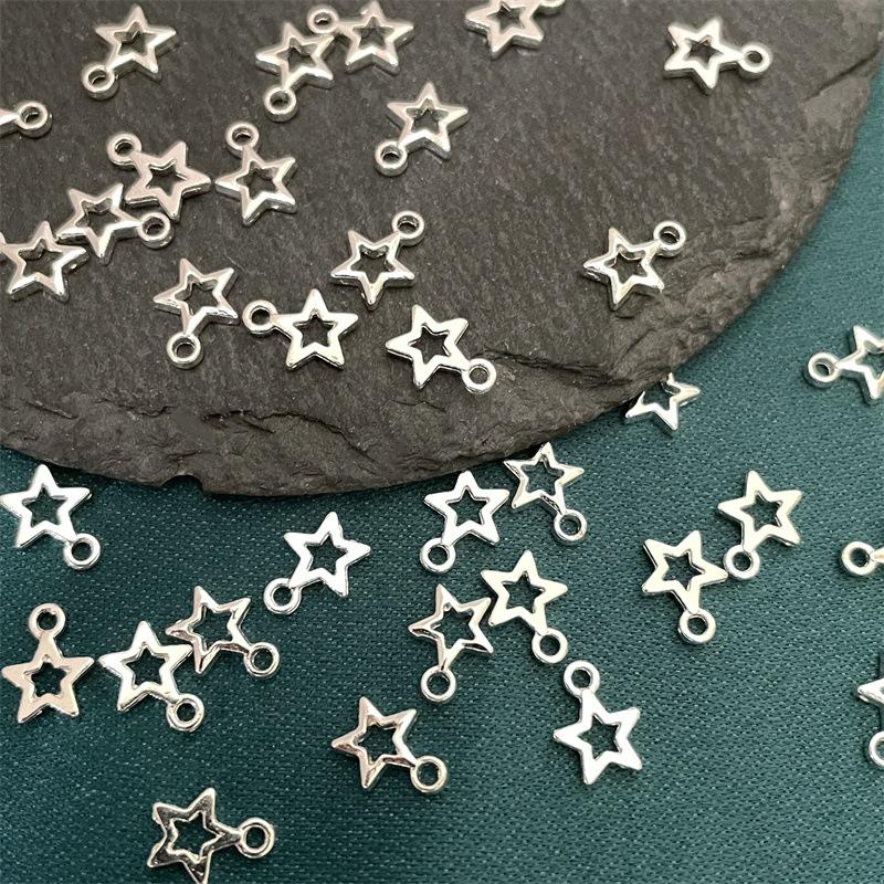 

50-Piece Alloy Heart, Star, Butterfly Pendant Beads for DIY Bracelets and Jewelry Making 50 pcs/bag