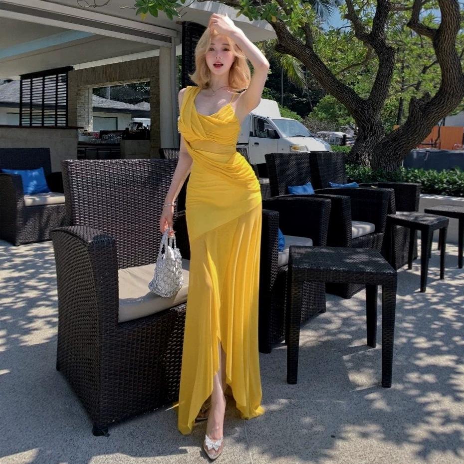 Vacation style Spice Girl yellow suspender dress women's summer pleated slim fishtail dress design sense mesh skirt