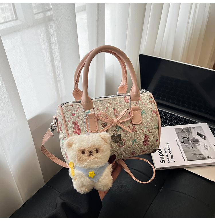 

Super fire niche portable pillow bag women 2025 new cute commuter shoulder messenger bag premium Boston bag single bag розовый