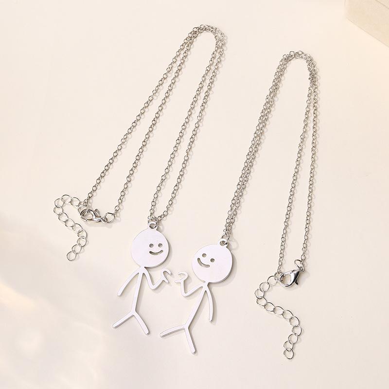 Alloy Little Man Pendant - European & American Cross-border Anime Layered Necklace for Women: High-end Niche Personality & Couple Style
