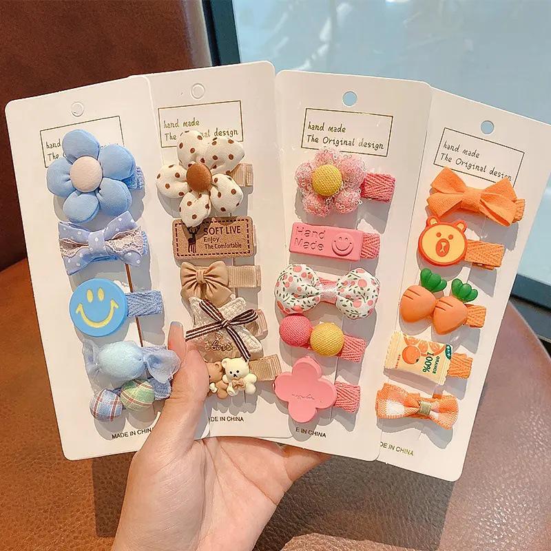 Květinové motýlkové mašle do vlasů v pastoračním stylu pro děti