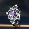 Elegant formal occasion halo ring with a curved metal frame and dazzling inlay details, a high-end accessory for women's engagement ceremonies and