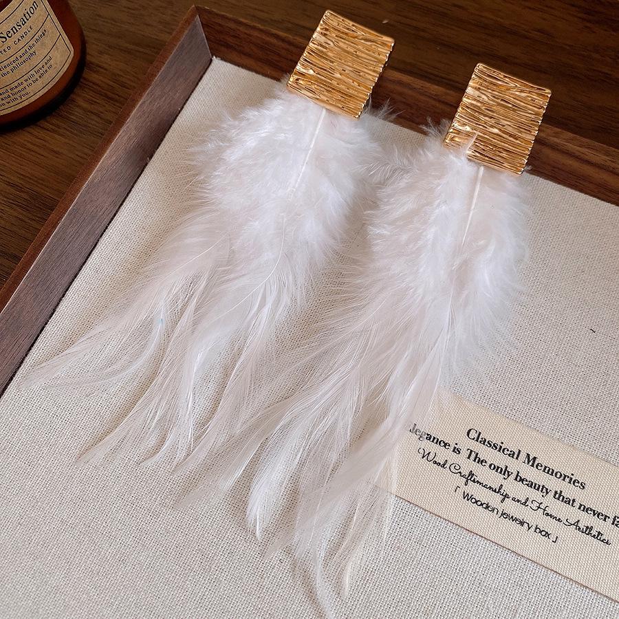 Ethnic Silver Needle Feather Tassel Stud Earrings – Versatile & Stylish Design