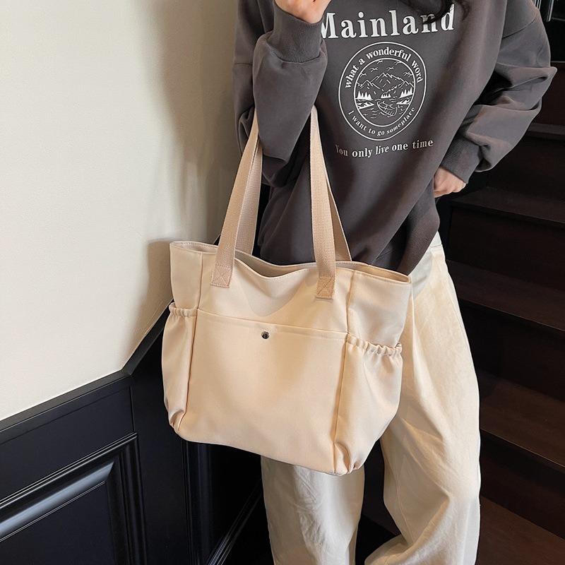 Simple canvas bag Women's tote bag Large capacity commuting Simple leisure College student work Shoulder bag Underarm bag