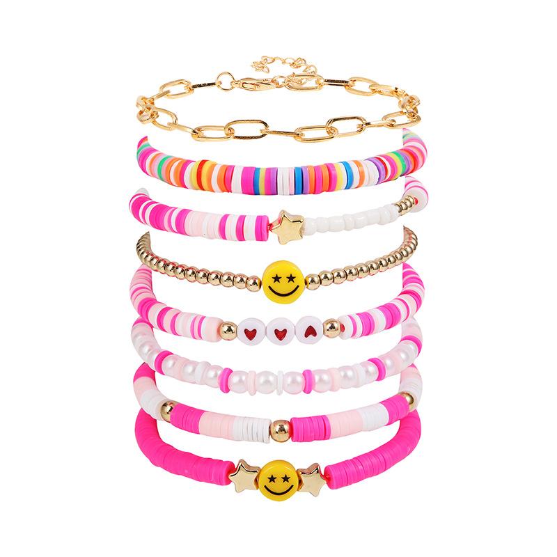 Korean version of fashion new multi-layer elastic thread soft pottery love smiley face bracelet set retro handmade pearl jewelry women
