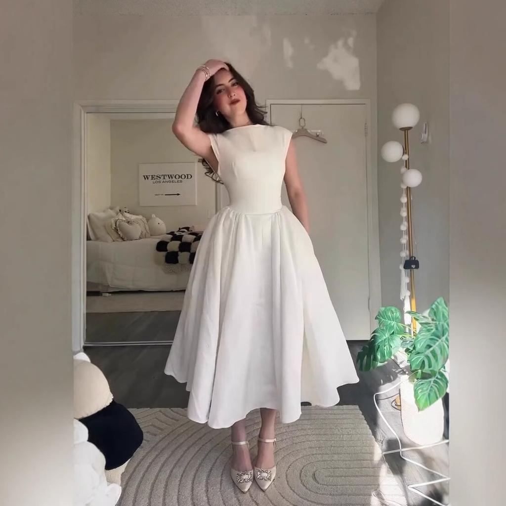 Europäische und amerikanische Damenbekleidung Sommer Neu Französisches Temperament Schlank und Dünn Großer Saum Rückenloses A-Linien-Kleid