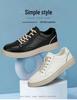 Spring 2024 Trendy Men's Breathable Leather Board Shoes - Comfortable, Hollow Design for Work and Casual Wear in White.