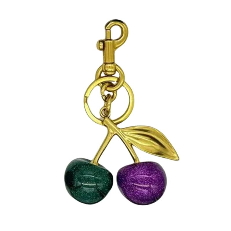 

Брелок-підвіска «Вишні» Милий Міцний Шарм зі сплаву для Сумок та Авто Модний Аксесуар для Вбрання Трендсеттерів фіолетовий/зелений