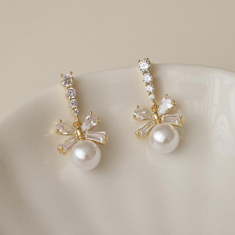 Pearl bow earrings women s summer sweet zircon stud earrings super flash s silver needle earrings design sense niche temperament