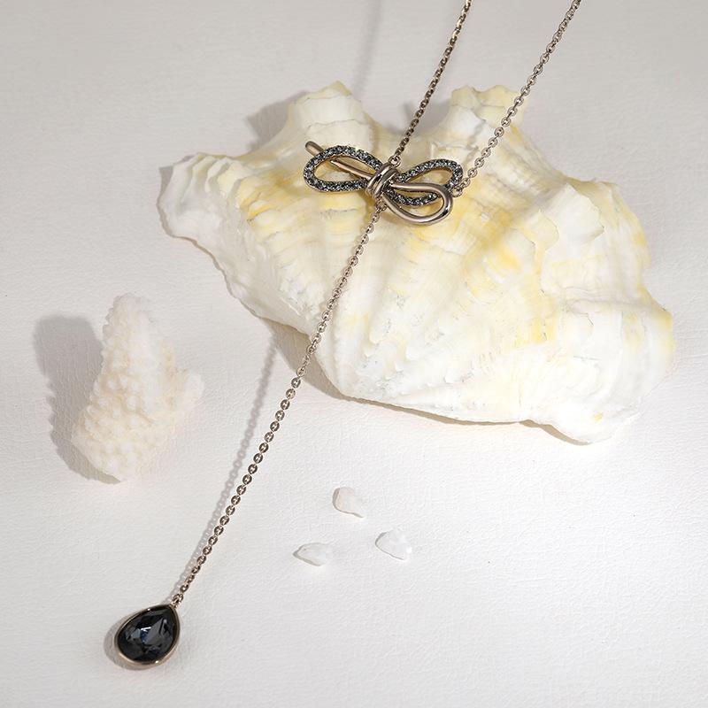 

Bowknot Womens Stylish Necklace In Premium Titanium Steel With Chic Tassel Accents Coffee Gold