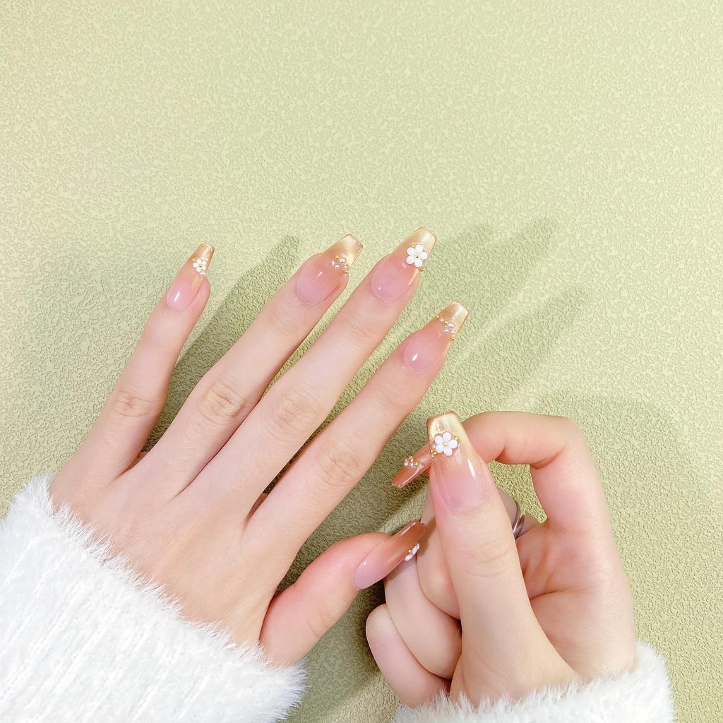 Handmade Nude Pink Cat Eye Manicure with Floral Design - Exquisite Shiny Nail Tips