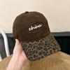 Korean retro-style leopard print baseball cap, a versatile and stylish accessory for women, offering sun protection and a color-blocked design that