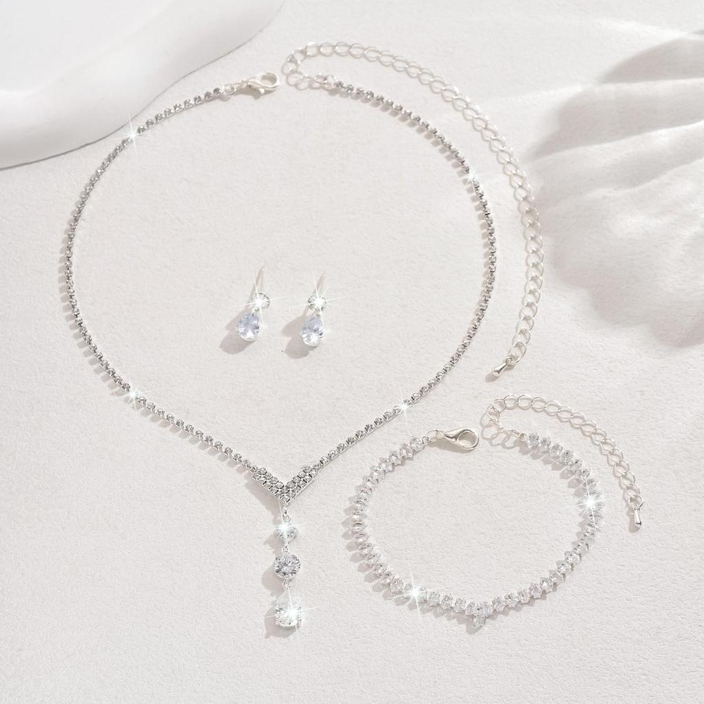 Elegant Zirconia Water Drop Jewelry Set: Pendant Earrings, Necklace, and Bracelet for Women
