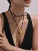 Oumika Geometric Pendant Necklace: High-Polished Stainless Steel with Black Cord, Clavicle-Length, Non-Fading, European & American Style.