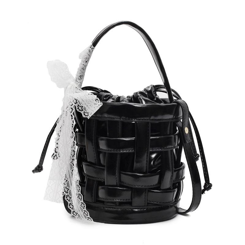 This year's popular bag 2025 new Korean version fashion hollow woven bag women's portable crossbody drawstring bucket bag