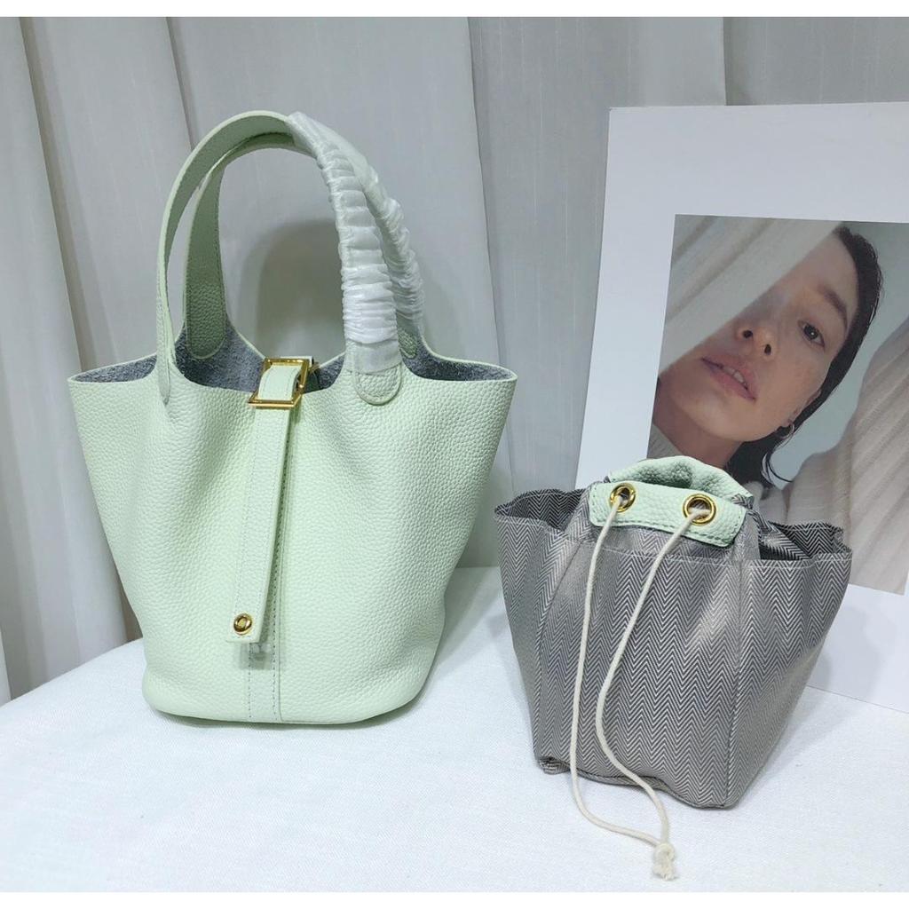 Spot wholesale top layer cowhide vegetable basket bag leather bucket bag commuter fashion lock buckle hand-held handbag woman