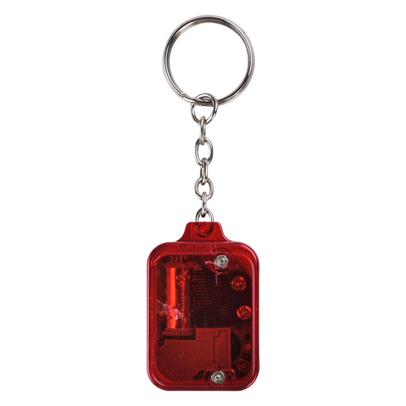 

Миниатюрный брелок-подвеска в виде музыкальной шкатулки Элегантный брелок в виде музыкальной шкатулки с украшением в виде мешочка с нотами Завораживающая идея для подарка