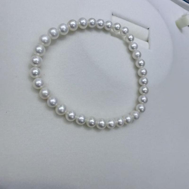 Natural Freshwater Pearl & Leather Bracelet: 3-6mm Nearly Flawless Pearls, Durable, High-End Design
