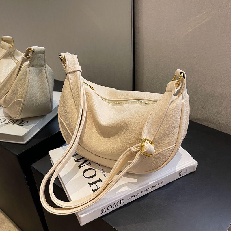 

Нишевая дизайнерская сумка женская 2025 новая текстура летняя сумка через плечо кроссбоди взрывная сумка-пельмень для поездок белый