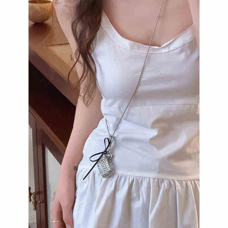 Sac tissé argenté, collier nœud, design personnalisé, chaîne de cou haut de gamme, niche mode, bijoux collier style doux et cool pour femmes