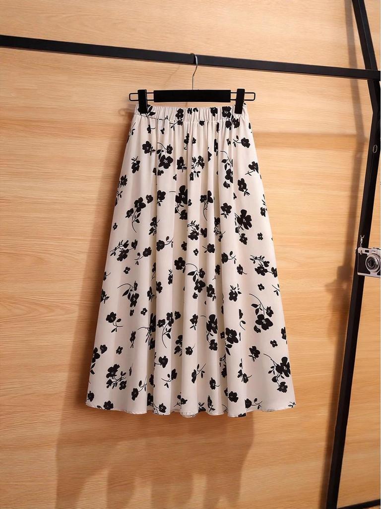 Women's Black Floral A-Line Midi Skirt: Versatile Spring/Autumn Fashion Trend.