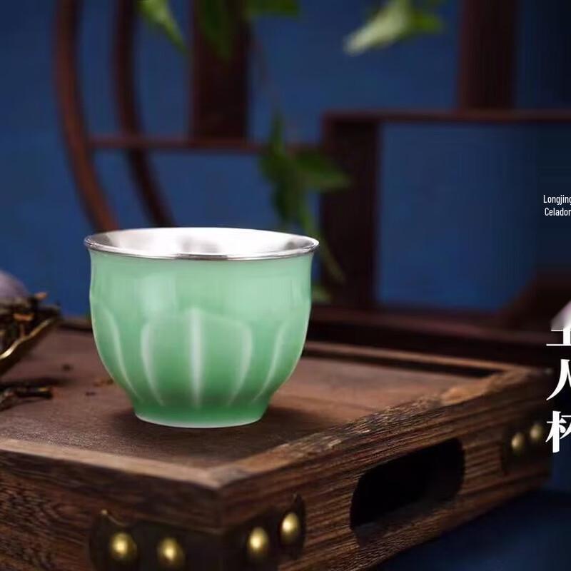 

Master Ceramic Tea Cup with Silver Lotus Design