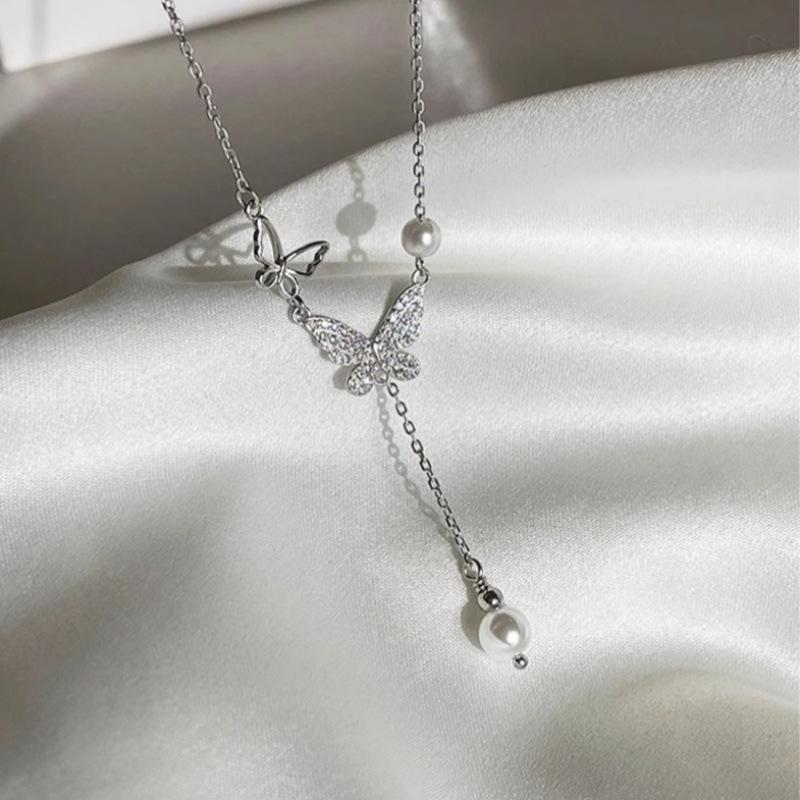 Elegant Pearl & Butterfly Tassel Necklace - 2024 Trendy High-End Luxury Women's Accessory