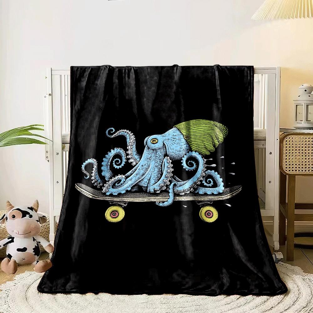 A blue squid wearing a green beanie riding a skateboard on a black background. for all seasons blanket lunch break throw gift 80cm x 120cm