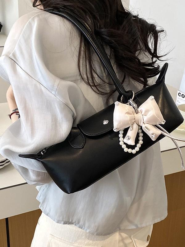 2026 French Light Luxury Cowhide Long Handle Dumpling Baguette Crossbody Bag