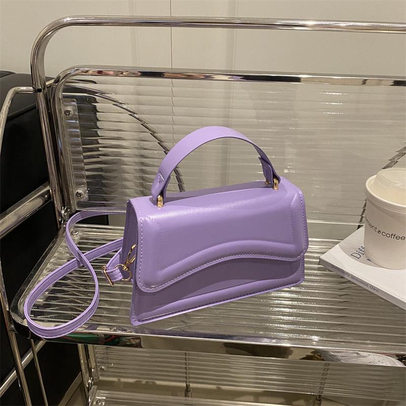 Personalized trend contrasting colors, fashionable and simple 2025 summer indentation new single shoulder oblique span portable small square bag