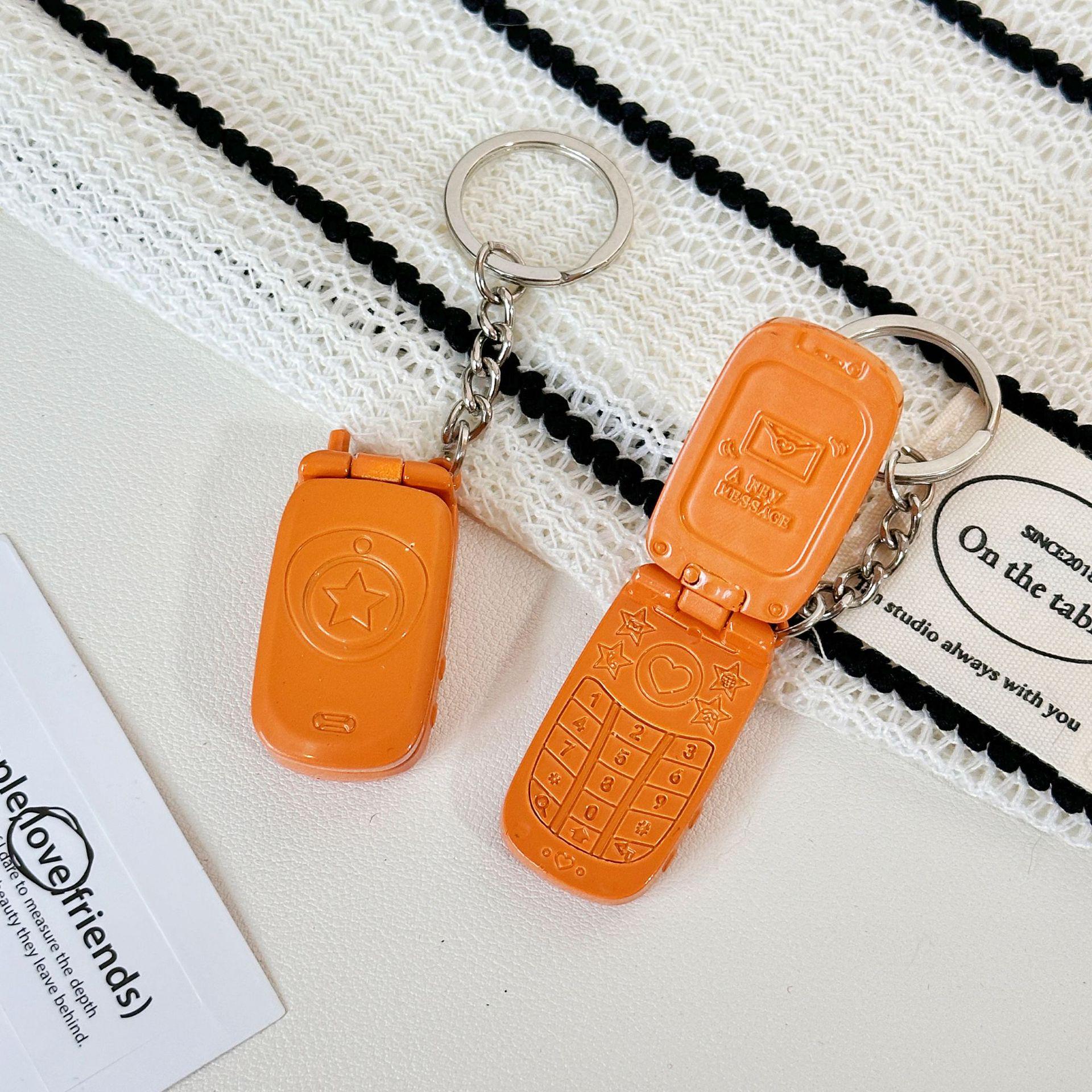 

Mini Metal Phone Backpack Ornament Keychain - Exquisite Pendant & Commemorative Gift.