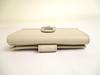 Autentisk Salvatore Ferragamo Gancini lysbeige skinn sølvfarget H/W bifold-lommebok #a701 pusset opp