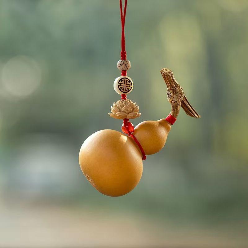 

Natural Gourd Dragon Head Hand-Woven Car Pendant for Peace and Good Luck
