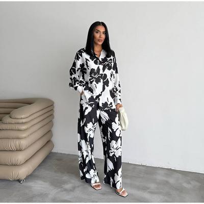 2025 Damen Schwarz-Weiß Floral Bedrucktes Langarm-Oberteil und Weitbein-Hosen Set Stilvolles und Elegantes Outfit für Damen