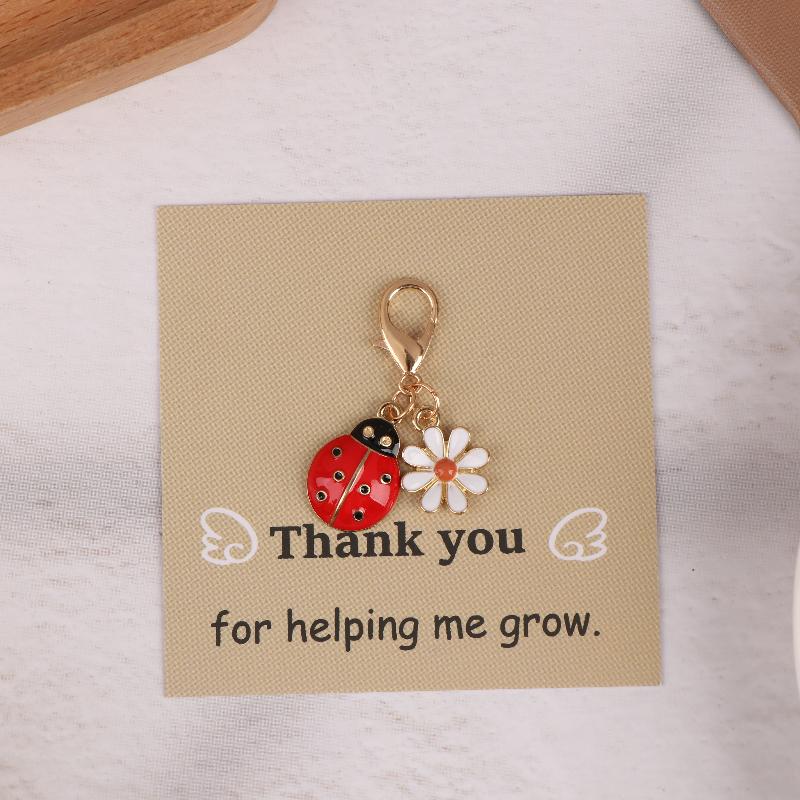 

1/3Pcs Creative Blessing Card Colorful Flower Ladybug Keychain Drip Oil Little Daisy Sunflower Backpack Pendant Accessories as the picture