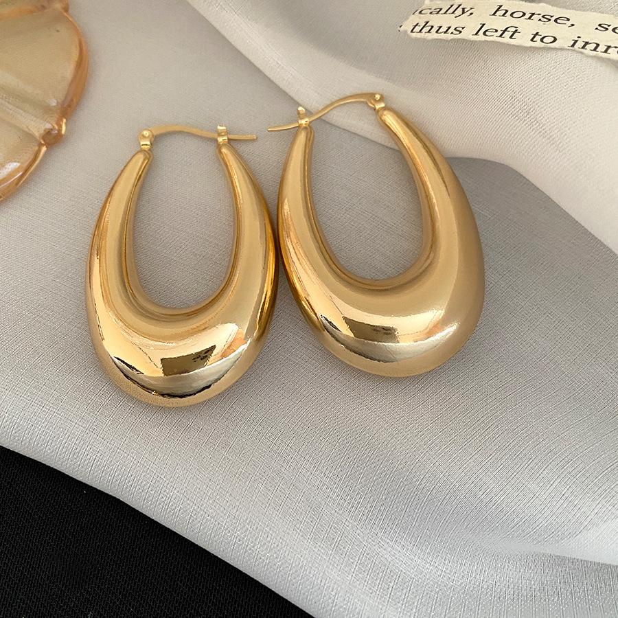 

European and American metal oversized water drop ear buckle niche design sense exaggerated earrings temperament advanced sense earrings