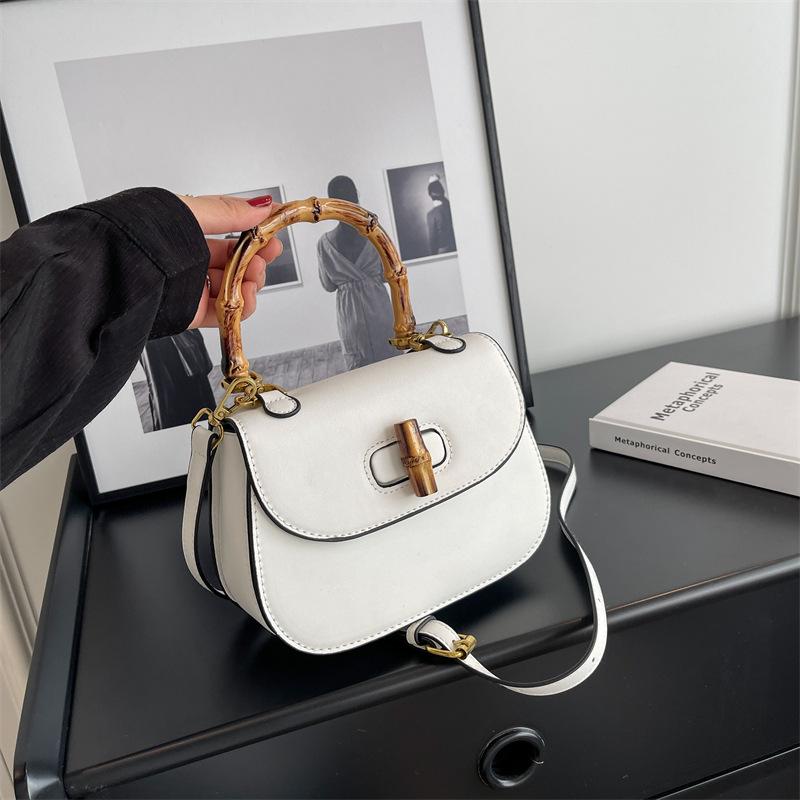 Premium retro saddle bag women's bag new fashion versatile shoulder messenger bag bamboo handbag bag women