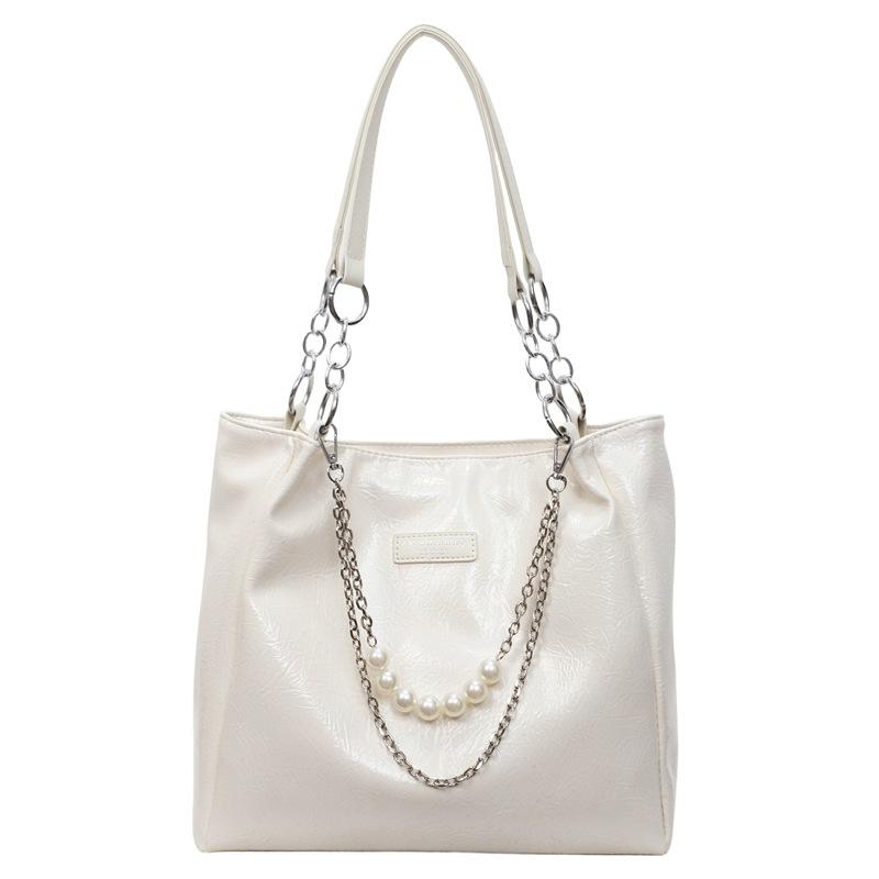 Borsa a tracolla da underarm ultra-alla moda, di nicchia, minimalista, ad alta capacità, nuova borsa tote da pendolare