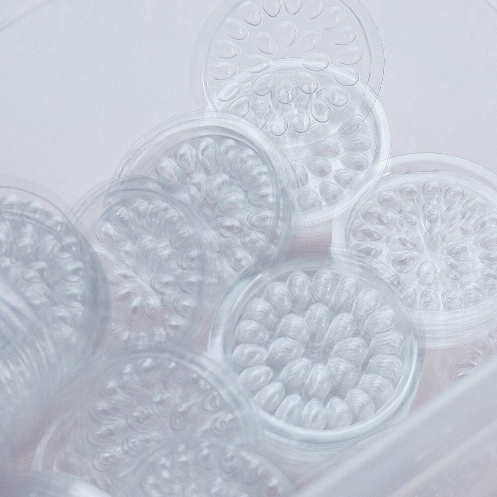 100 stücke Einweg Wimpern Verlängerung Kleber Halter Blume Form Kleber Pads Falsche Wimpern Palette Pads Kunststoff Dichtung Make-Up-Tools